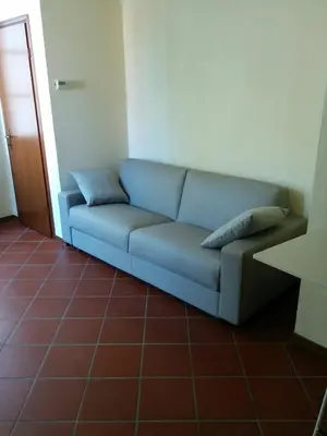 Area soggiorno di Honey House Parma