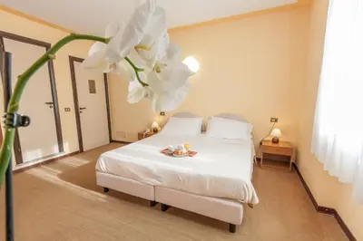 Letto o letti in una camera di Hotel San Marco
