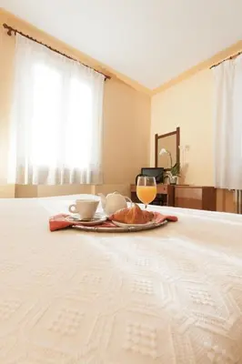Letto o letti in una camera di Hotel San Marco