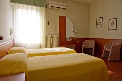 Letto o letti in una camera di Hotel Europa