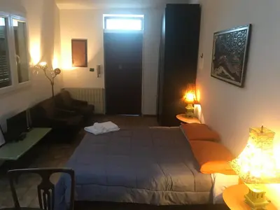 Letto o letti in una camera di Mood-Cavour