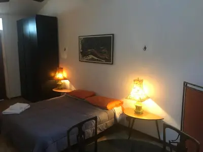 Letto o letti in una camera di Mood-Cavour