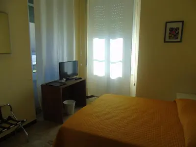 Letto o letti in una camera di Affittacamere Bel Sole
