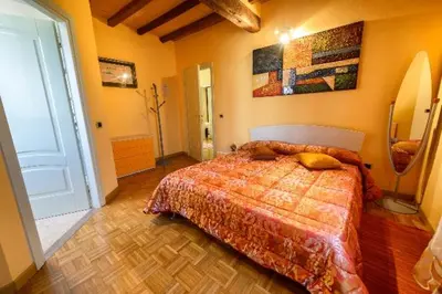 Letto o letti in una camera di La Fossetta B&B