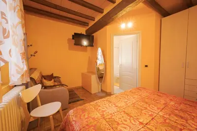 Letto o letti in una camera di La Fossetta B&B
