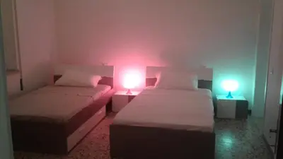 Letto o letti in una camera di NOEMI & JULIENNE