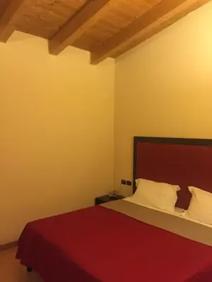 Letto o letti in una camera di Hotel Motel Galaxy Reggio Emilia