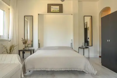 Letto o letti in una camera di Moneglia mare e relax