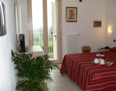 Letto o letti in una camera di Residence Hotel Matilde