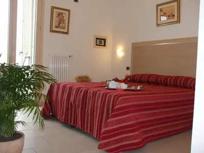 Letto o letti in una camera di Residence Hotel Matilde