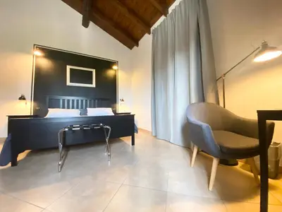 Letto o letti in una camera di B&B STAZIONE DON CAMILLO
