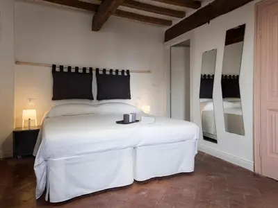 Letto o letti in una camera di Borgodieci