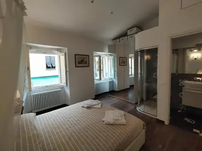 Letto o letti in una camera di Casa Mantegna