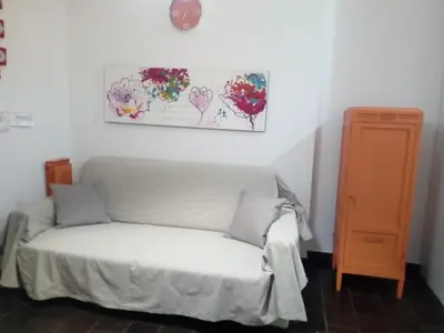Letto o letti in una camera di Tigullio Vacations Il Ciliegio Apartment