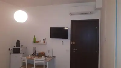 TV o dispositivi per l'intrattenimento presso Le camere di Sabrina con bagno in camera