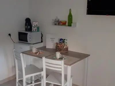TV o dispositivi per l'intrattenimento presso Le camere di Sabrina con bagno in camera