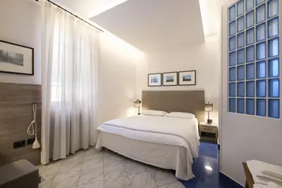 Letto o letti in una camera di Hotel Ristorante Alla Vittoria
