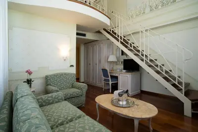 TV o dispositivi per l'intrattenimento presso Suite Hotel Nettuno