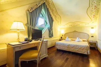 Letto o letti in una camera di Suite Hotel Nettuno