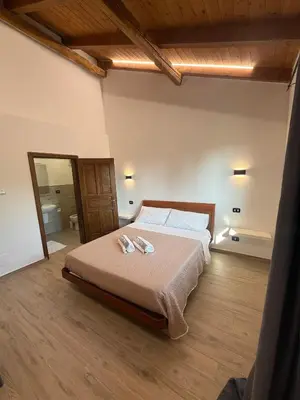 Letto o letti in una camera di Affittacamere La Casa Del Tiglio