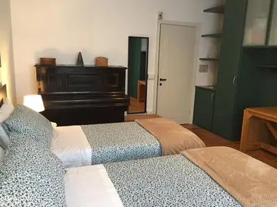 Letto o letti in una camera di B&B Villa al Parco