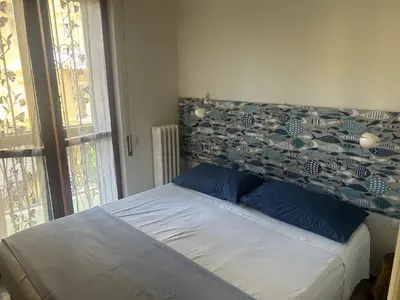 Letto o letti in una camera di BLUE Apartment