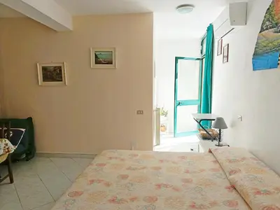 Letto o letti in una camera di Chez Diego with AC and garden