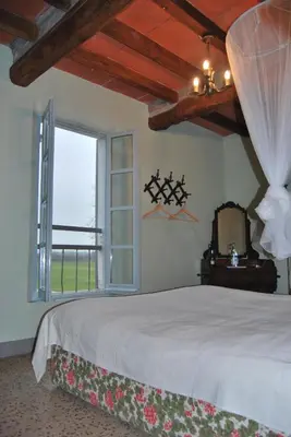 Letto o letti in una camera di Tenuta Rivalazzo