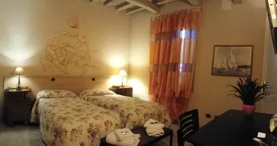 Letto o letti in una camera di La Casa del Viandante