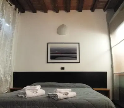 Letto o letti in una camera di La Casa del Viandante