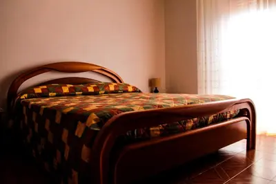 Letto o letti in una camera di L'AGOrà - Ca' du punte