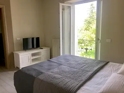 Letto o letti in una camera di L’infinito residence