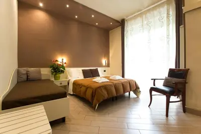 Letto o letti in una camera di Affittacamere Serena