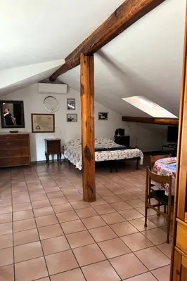 Letto o letti in una camera di La Soffitta di Maria
