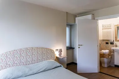 Letto o letti in una camera di Olivenere agriturismo