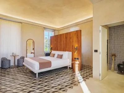 Letto o letti in una camera di Villa Riviera Resort