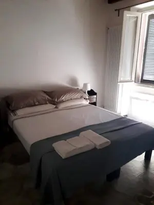 Letto o letti in una camera di B&B Castellani