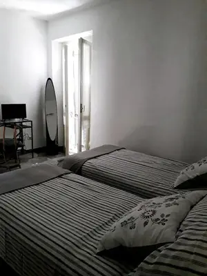 Letto o letti in una camera di B&B Castellani
