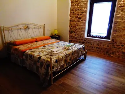 Letto o letti in una camera di La Piazzetta