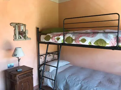 Letto o letti in una camera di Il Paradiso monolocale Cottage