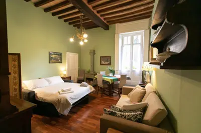 Letto o letti in una camera di Il Balcone dell'Angiol d 'Or