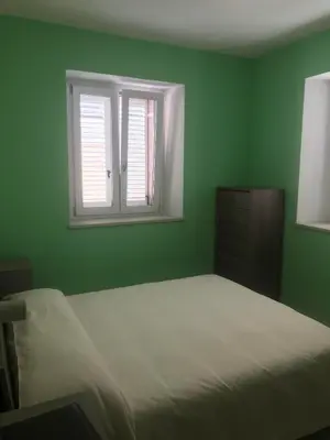 Letto o letti in una camera di Castelnovo Resort
