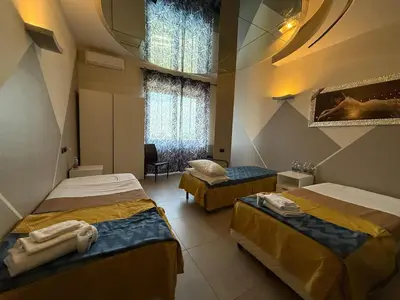 Letto o letti in una camera di La Gritta srl