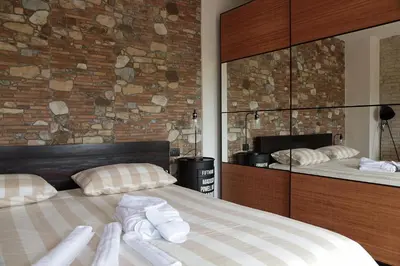 Letto o letti in una camera di LA MAESTA'