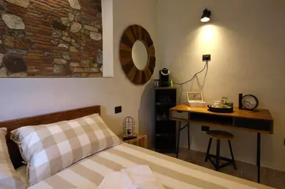 Letto o letti in una camera di LA MAESTA'