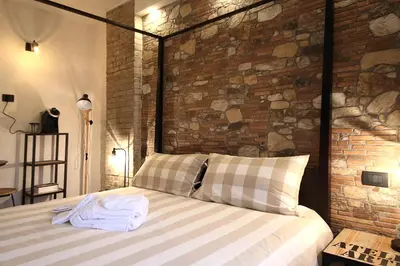 Letto o letti in una camera di LA MAESTA'