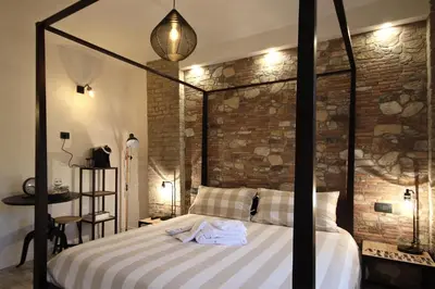 Letto o letti in una camera di LA MAESTA'