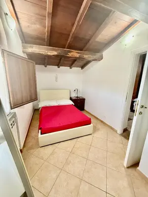 Letto o letti in una camera di Casa vacanze Elena