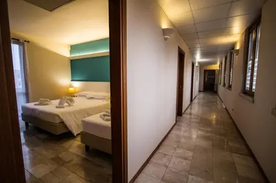 Letto o letti in una camera di Hotel Elefante