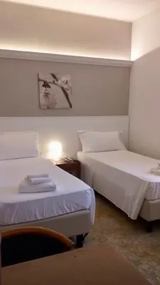 Letto o letti in una camera di Hotel Elefante